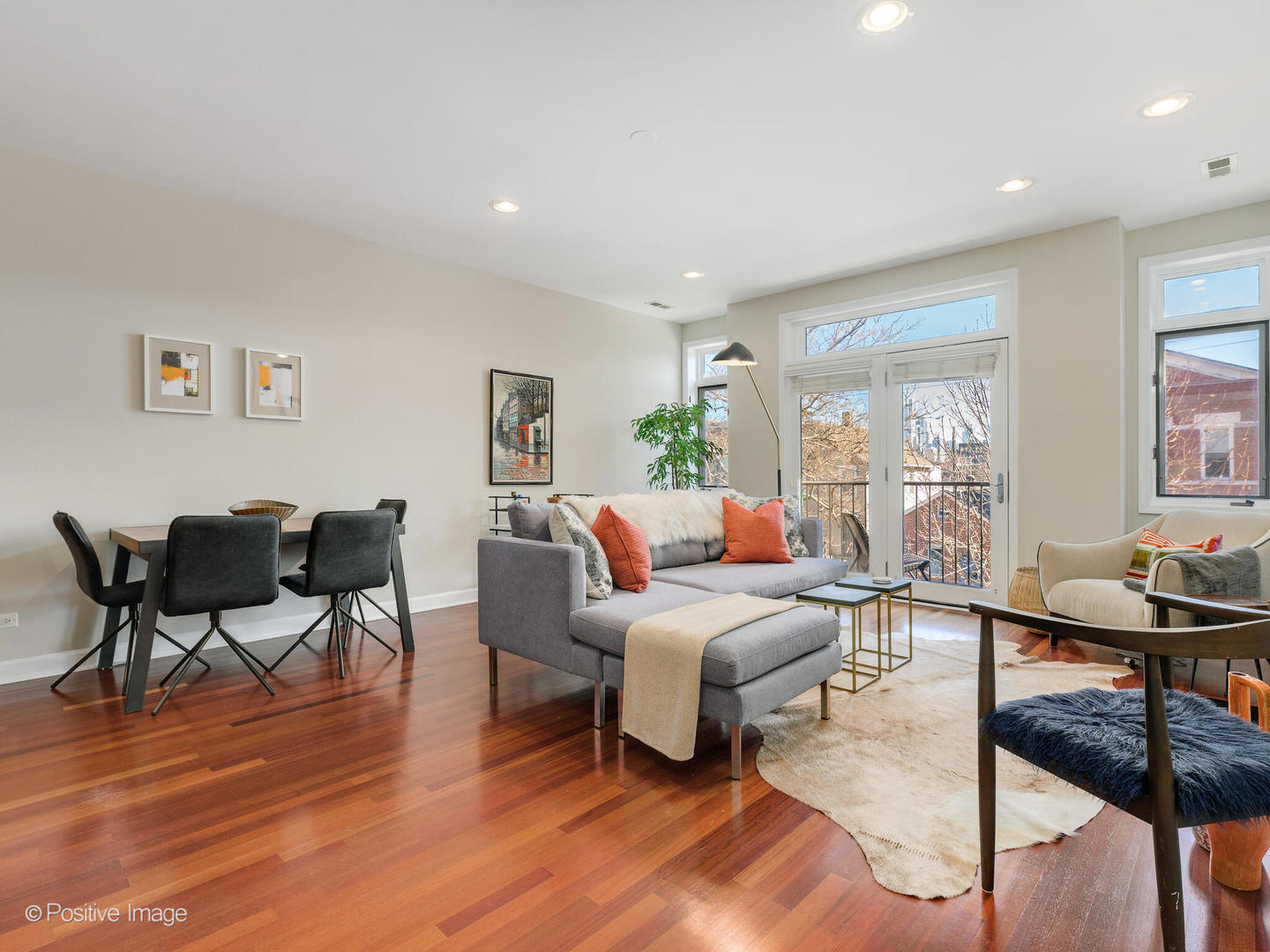 1704 South Morgan Street, Unit 2 Chicago, IL 60608 - Photo 8 of 18 a living room with furniture and a wooden floor