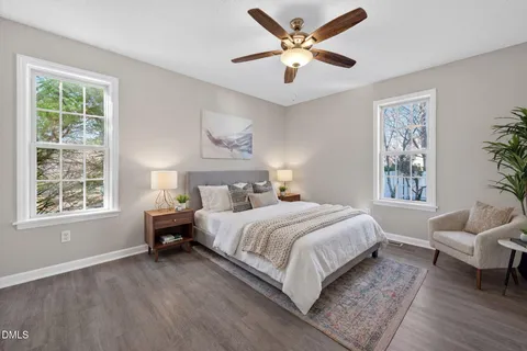 a kitchen with a sink stove top oven and cabinets