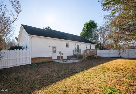 a view of road with large trees