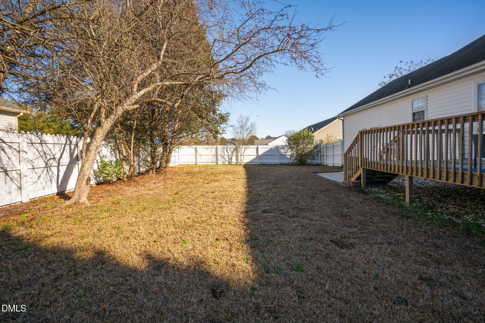 11 Hemlock Court Angier, NC 27501 - Photo 39 of 48 a view of backyard with wooden fence