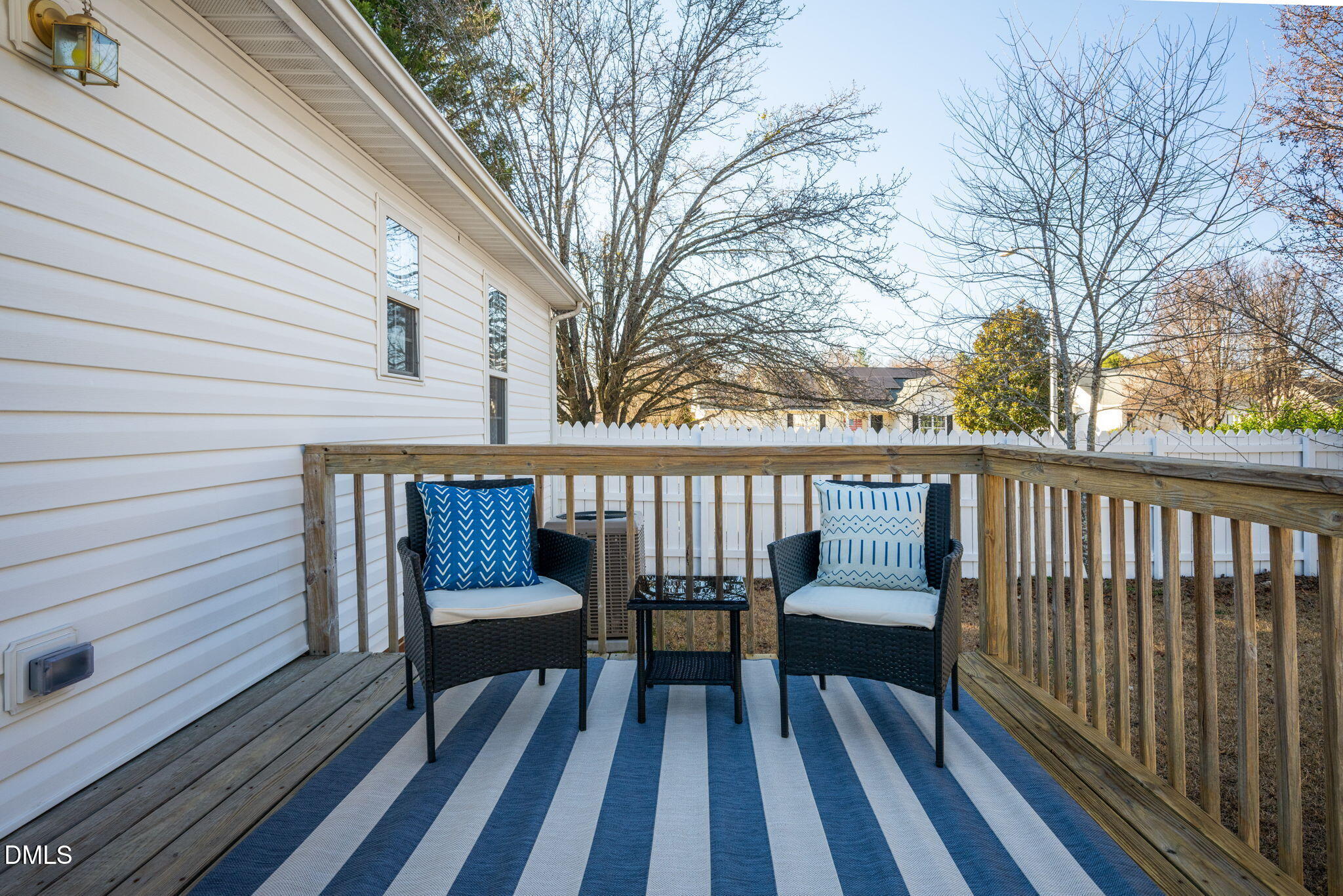 11 Hemlock Court Angier, NC 27501 - Photo 42 of 48 a view of a wooden deck with a bench