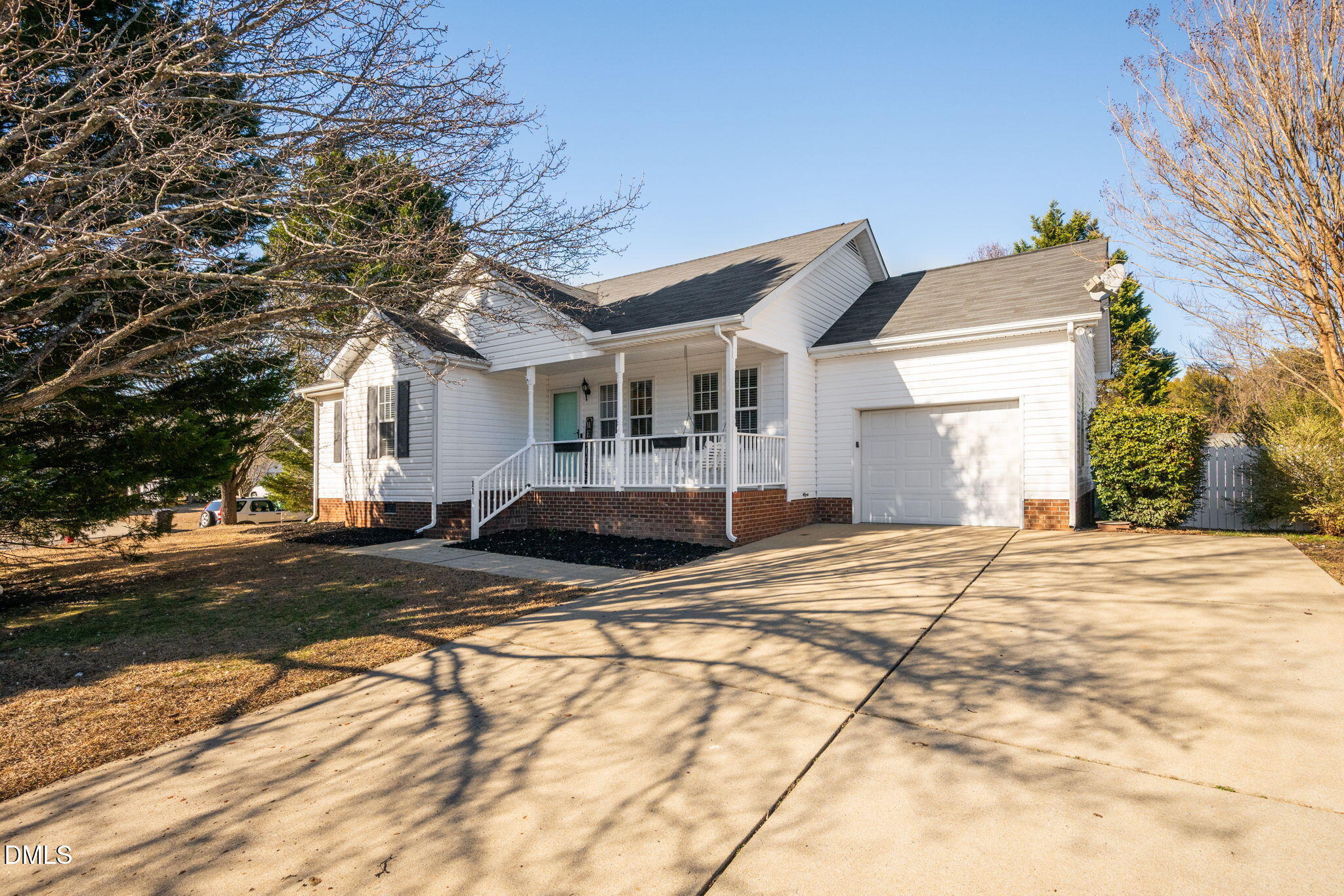 11 Hemlock Court Angier, NC 27501 - Photo 6 of 48 a view of a house with snow on the road