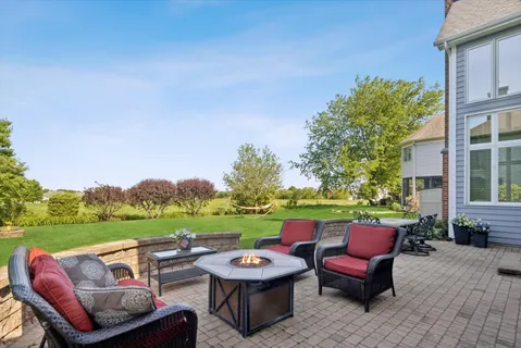 a view of a yard with furniture