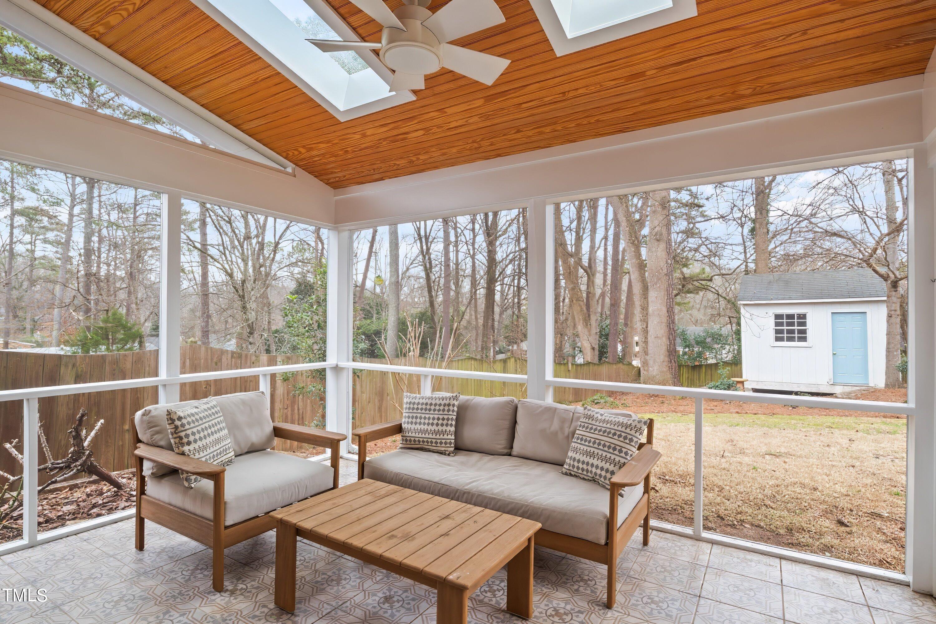 528 Harvard Street Raleigh, NC 27609 - Photo 27 of 44 a living room with furniture and a large window