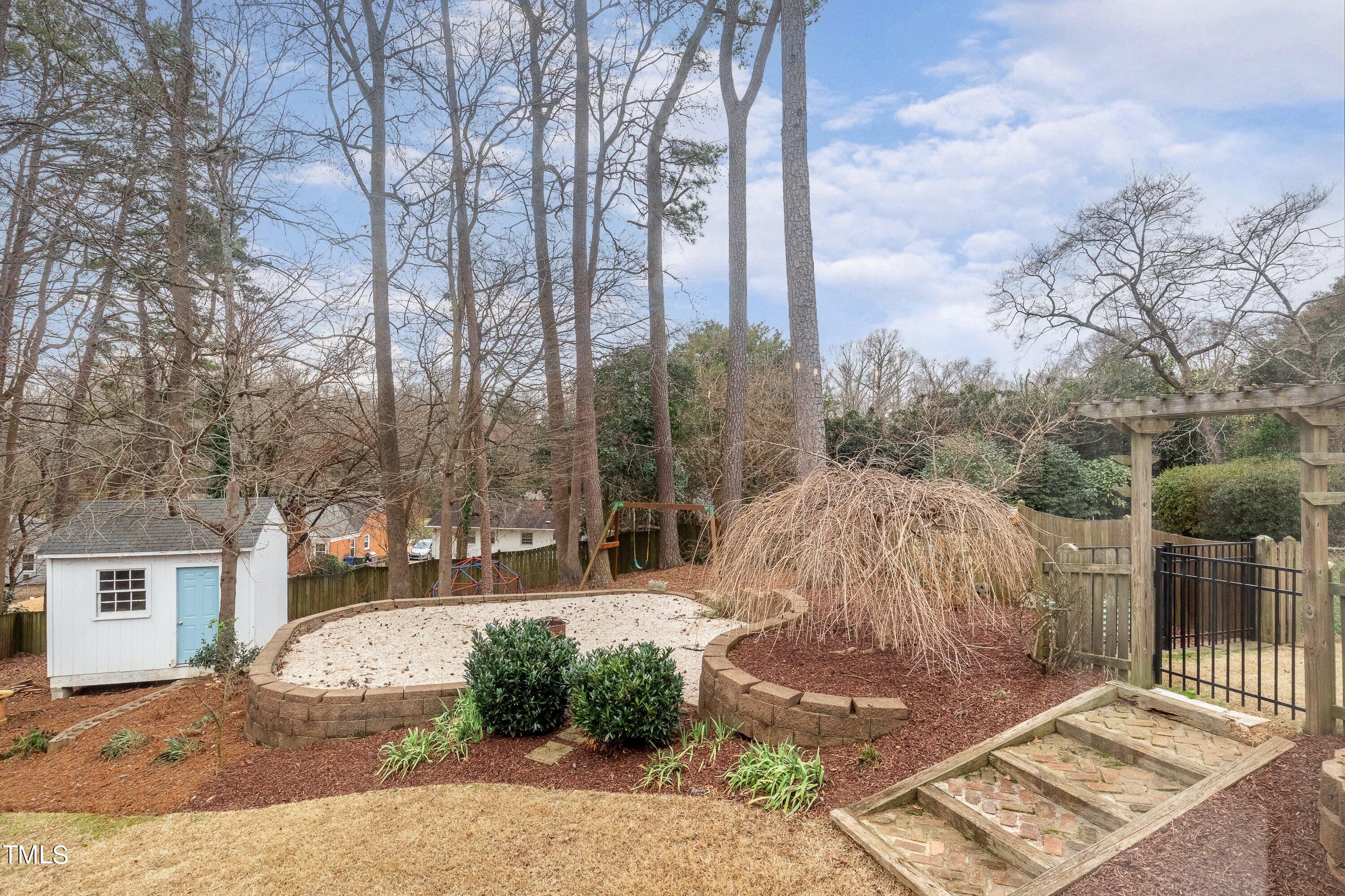 528 Harvard Street Raleigh, NC 27609 - Photo 29 of 44 a view of a backyard