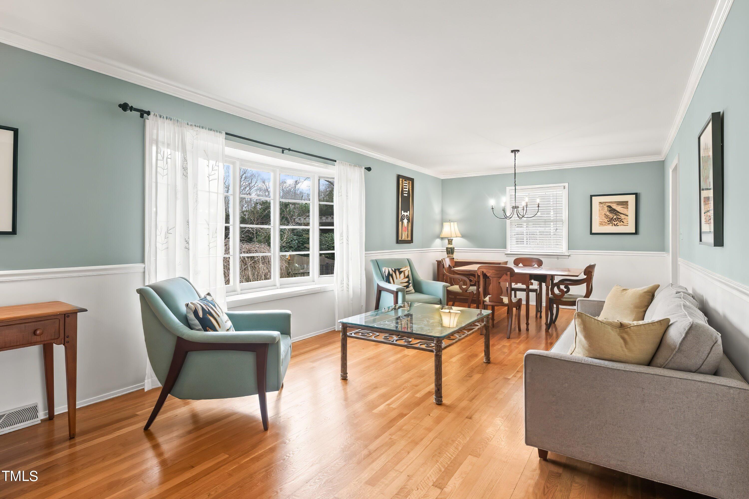 528 Harvard Street Raleigh, NC 27609 - Photo 5 of 44 a living room with furniture and a large window