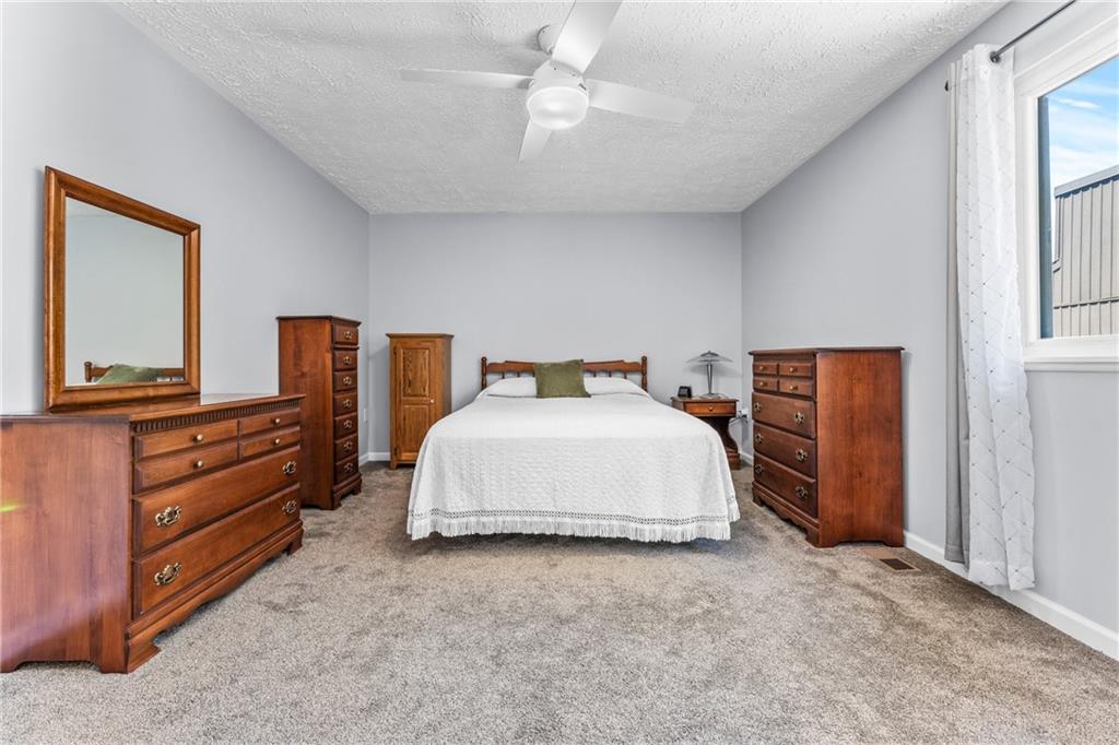 332 Central Drive Cranberry Township, PA 16066 - Photo 16 of 28 a spacious bedroom with a bed and a dresser