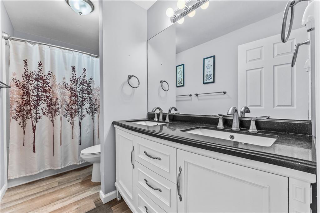 332 Central Drive Cranberry Township, PA 16066 - Photo 17 of 28 a bathroom with a granite countertop sink and a mirror