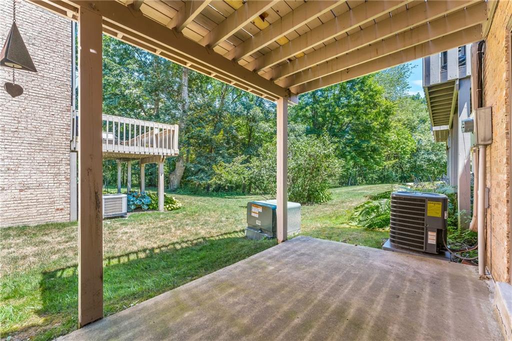 332 Central Drive Cranberry Township, PA 16066 - Photo 21 of 28 a view of a porch with a garden