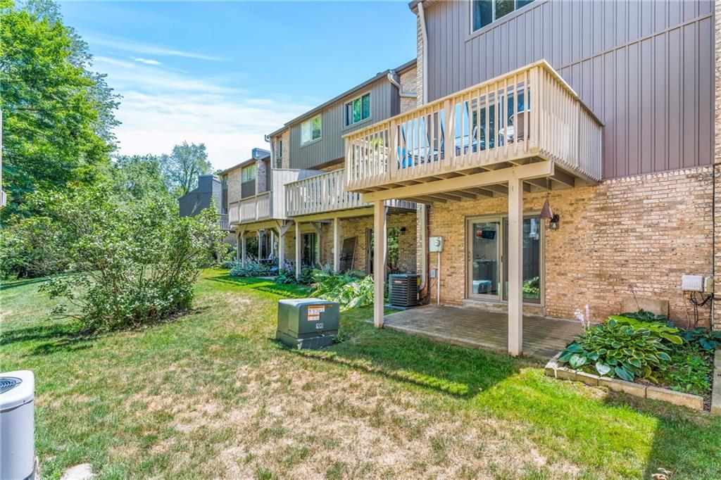 332 Central Drive Cranberry Township, PA 16066 - Photo 23 of 28 a front view of a house with garden