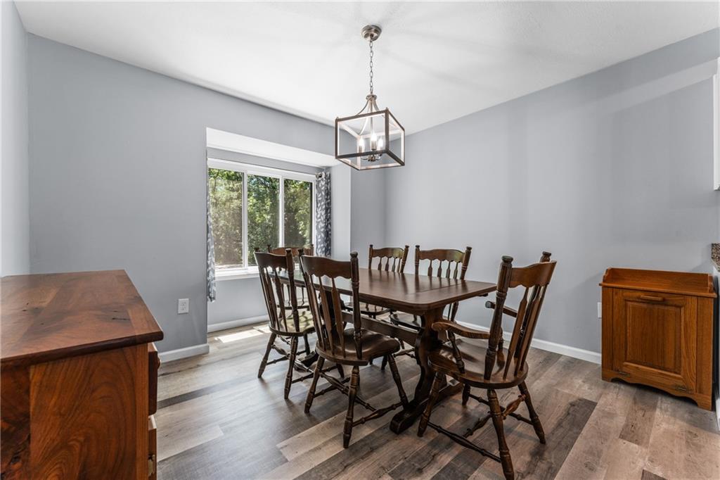 332 Central Drive Cranberry Township, PA 16066 - Photo 8 of 28 a view of a dining room with furniture window and wooden floor