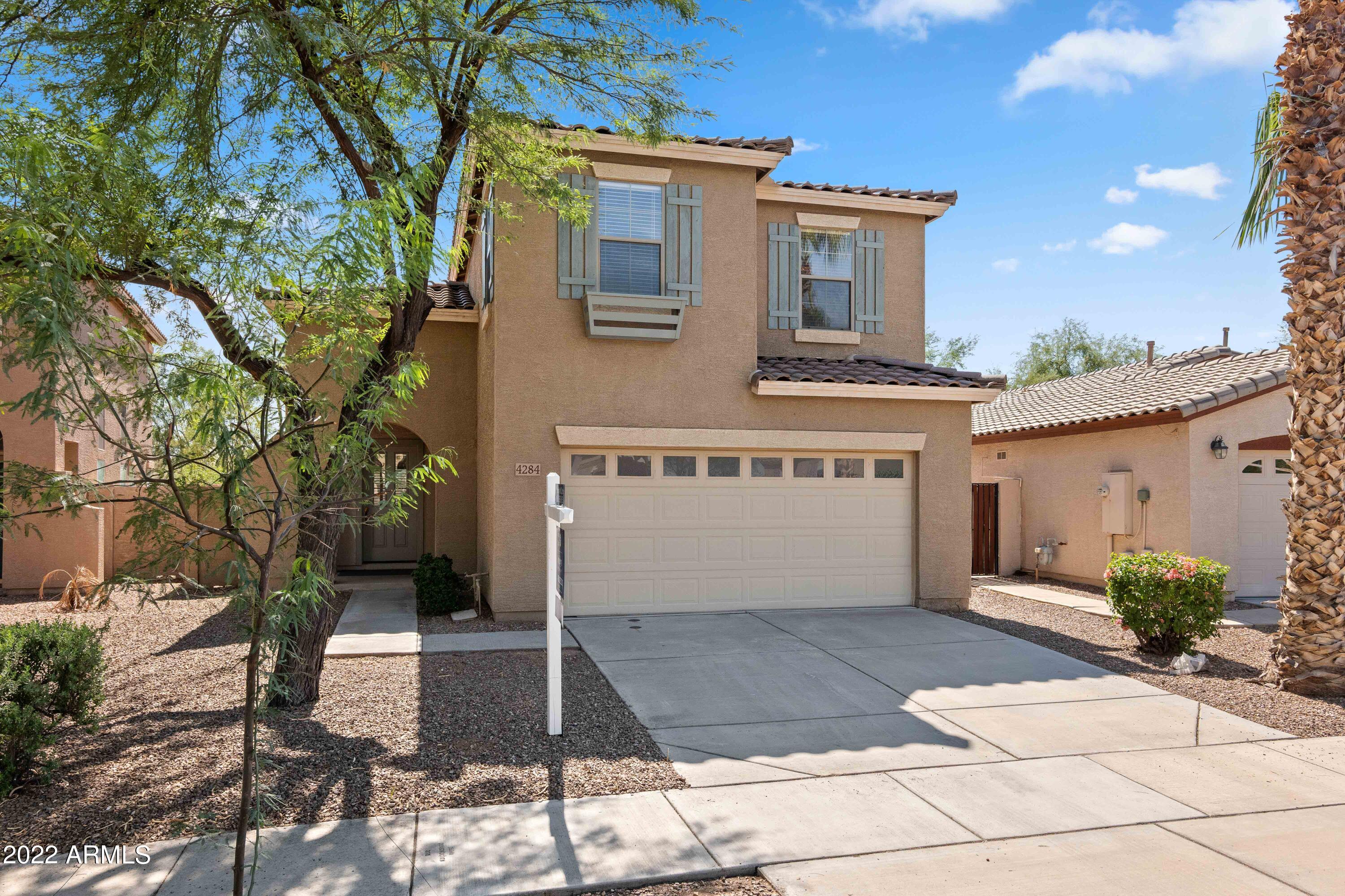 4284 South Woodshed Road Gilbert, AZ 85297 - Photo 2 of 22 2-Car Garage