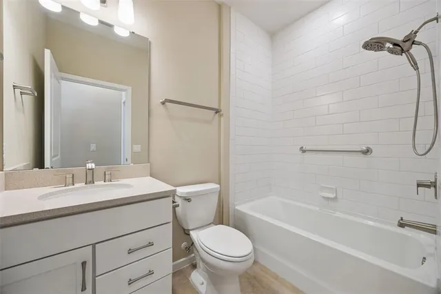 a view of a dining room with furniture and window