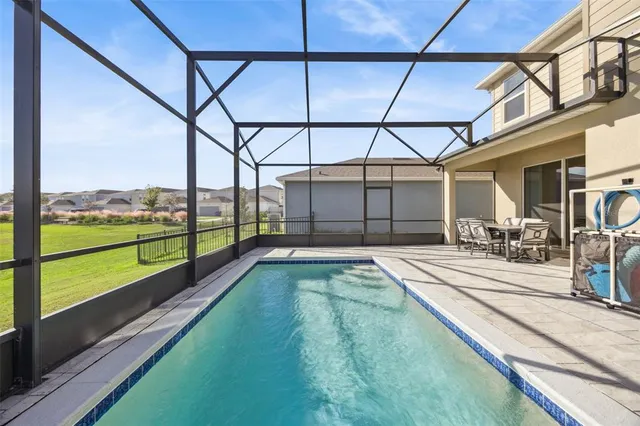a view of a park with swings and slides