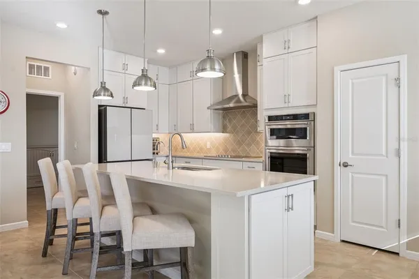 $507,000 | 2604 Blowing Breeze Avenue, Kissimmee, FL 34744