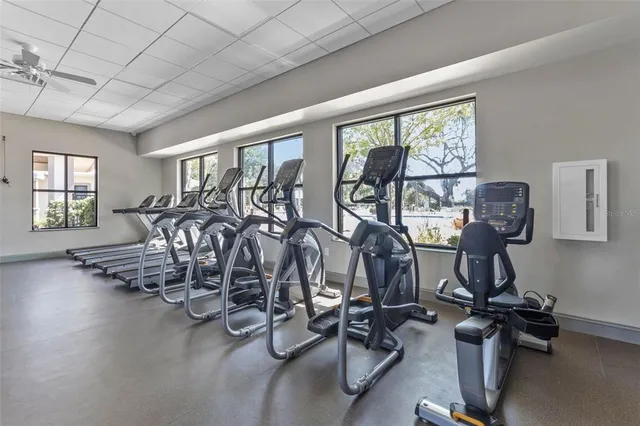a view of a swimming pool with a table and chairs