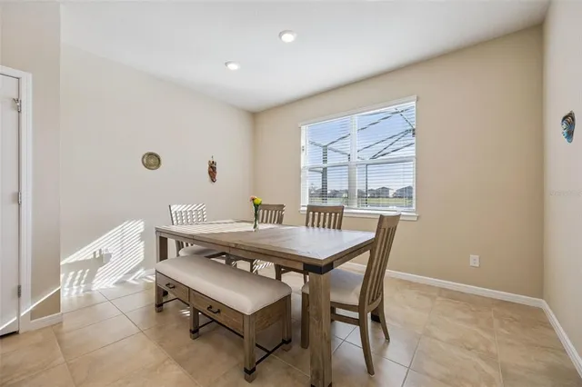 a room with furniture a washer and dryer