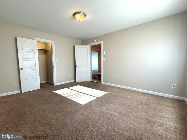 an empty room with closet