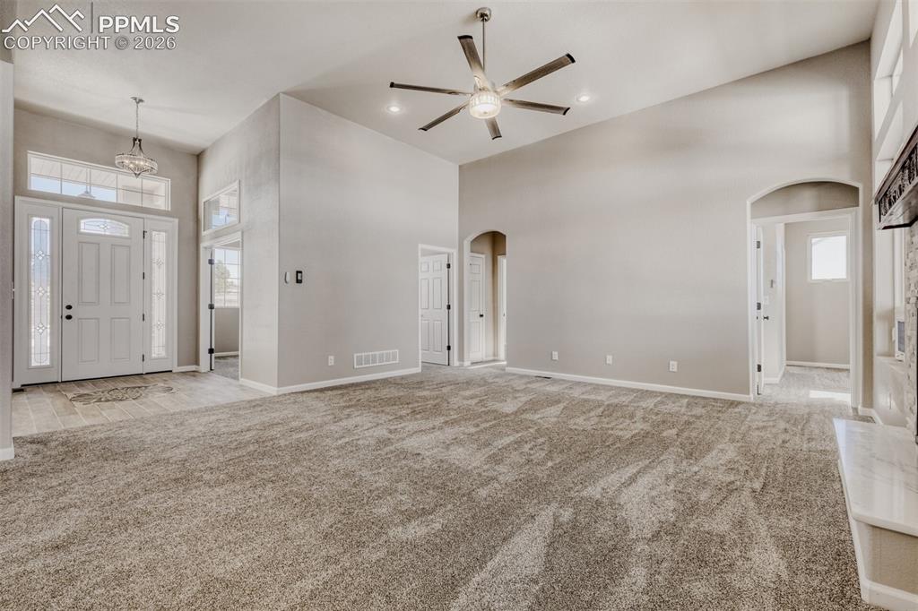 13680 Woodlake Road Elbert, CO 80106 - Photo 6 of 47 Living Room with open concept and covered deck.