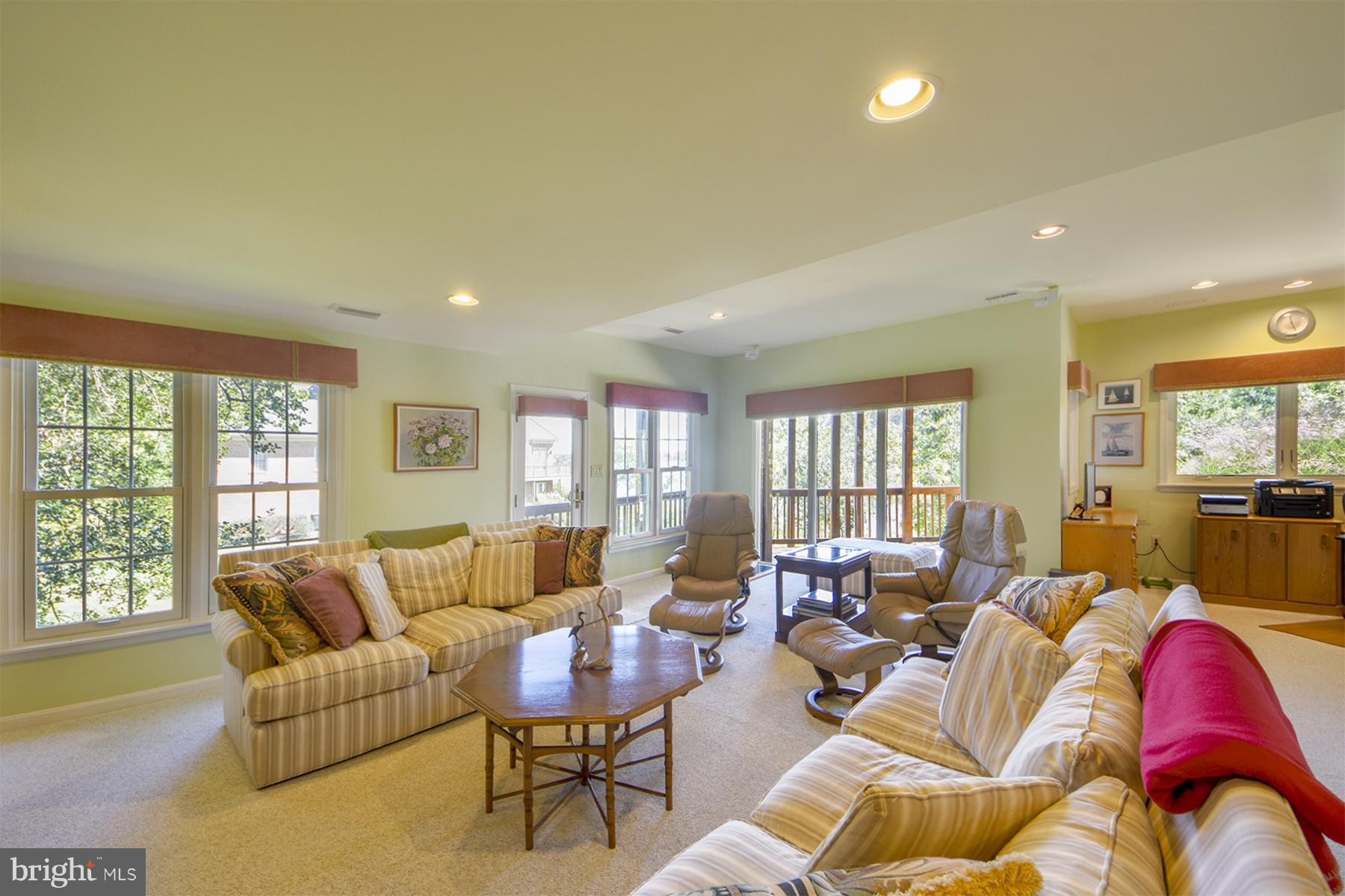 960 South River Landing Road, Unit 960 Edgewater, MD 21037 - Photo 21 of 29 Lower level family room walks out to a deck