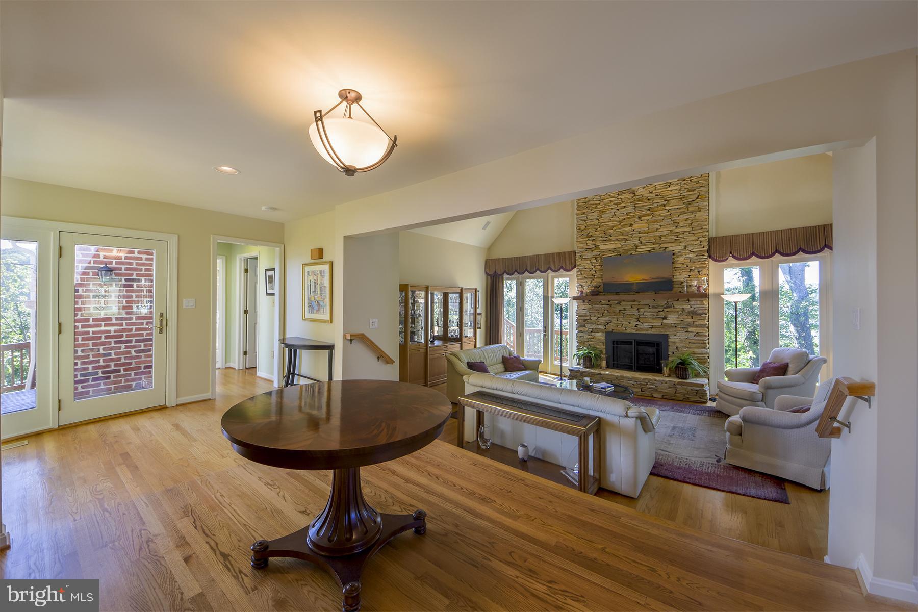960 South River Landing Road, Unit 960 Edgewater, MD 21037 - Photo 6 of 29 Large open foyer allows water views upon entry