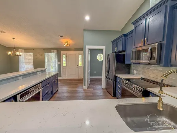 a big room with closet and windows