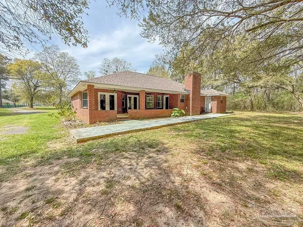 a view of a big yard with an empty space