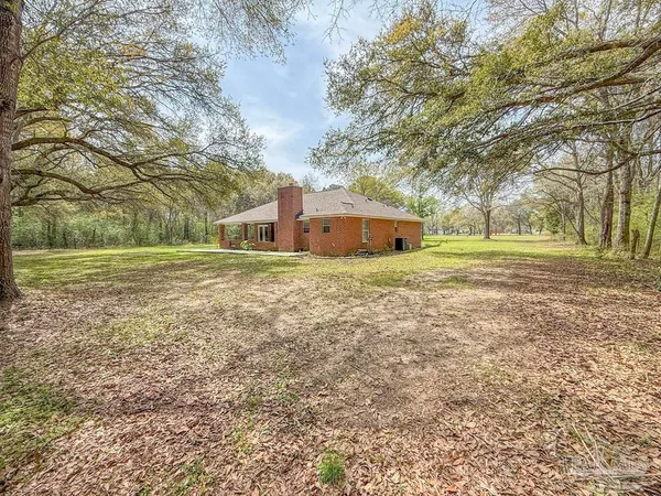 a fire hydrant in the middle of a field