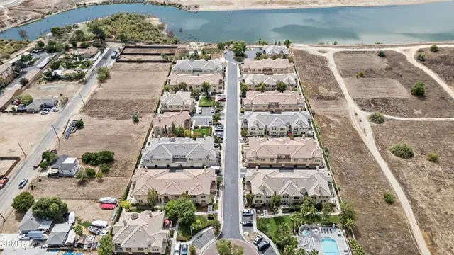 an aerial view of residential house with outdoor space