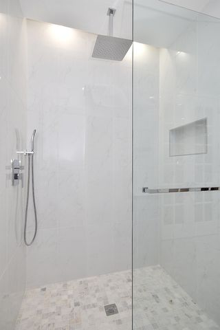 a front view of a house with a garage