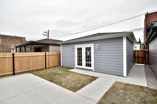 a kitchen with a stove oven and sink