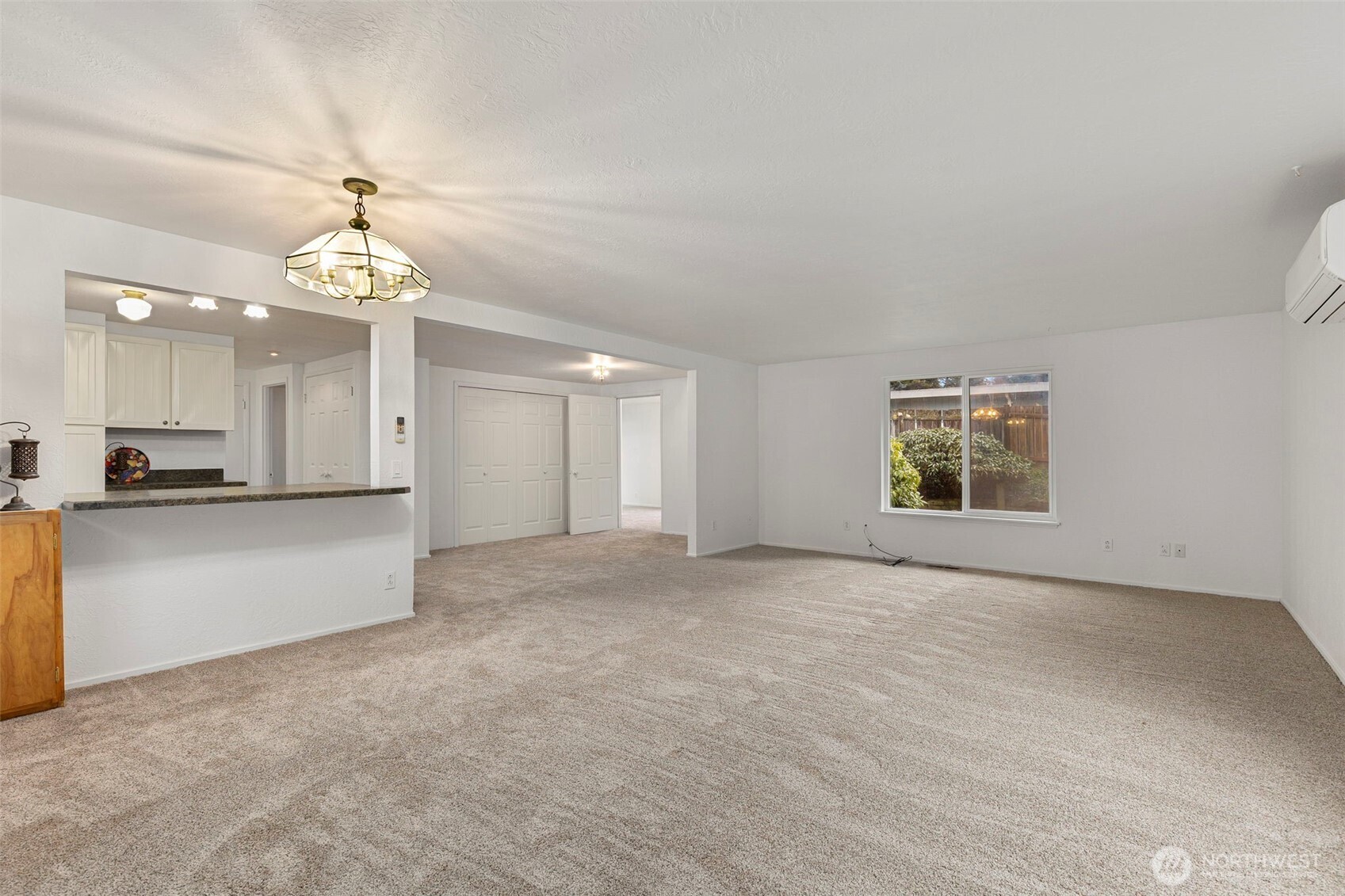 26009 Barrett Road Northeast Kingston, WA 98346 - Photo 12 of 25 a view of a kitchen with a sink and cabinets