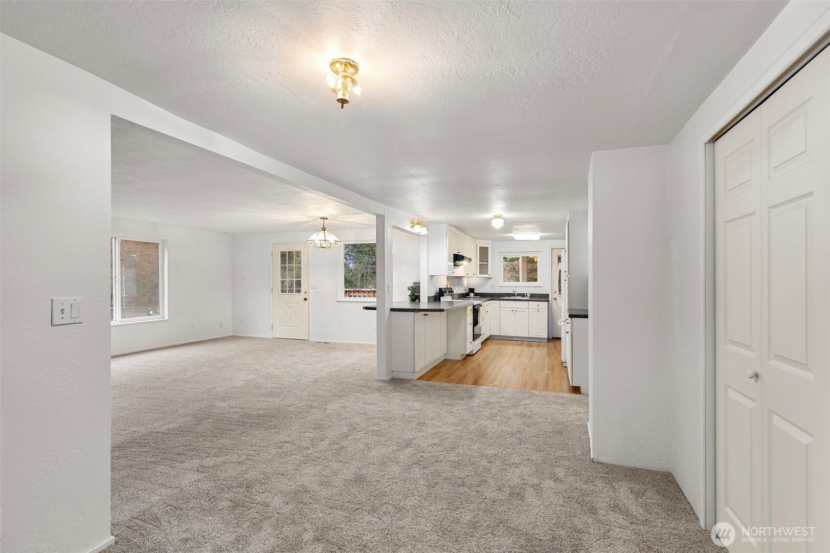 26009 Barrett Road Northeast Kingston, WA 98346 - Photo 14 of 25 a view of kitchen and living room