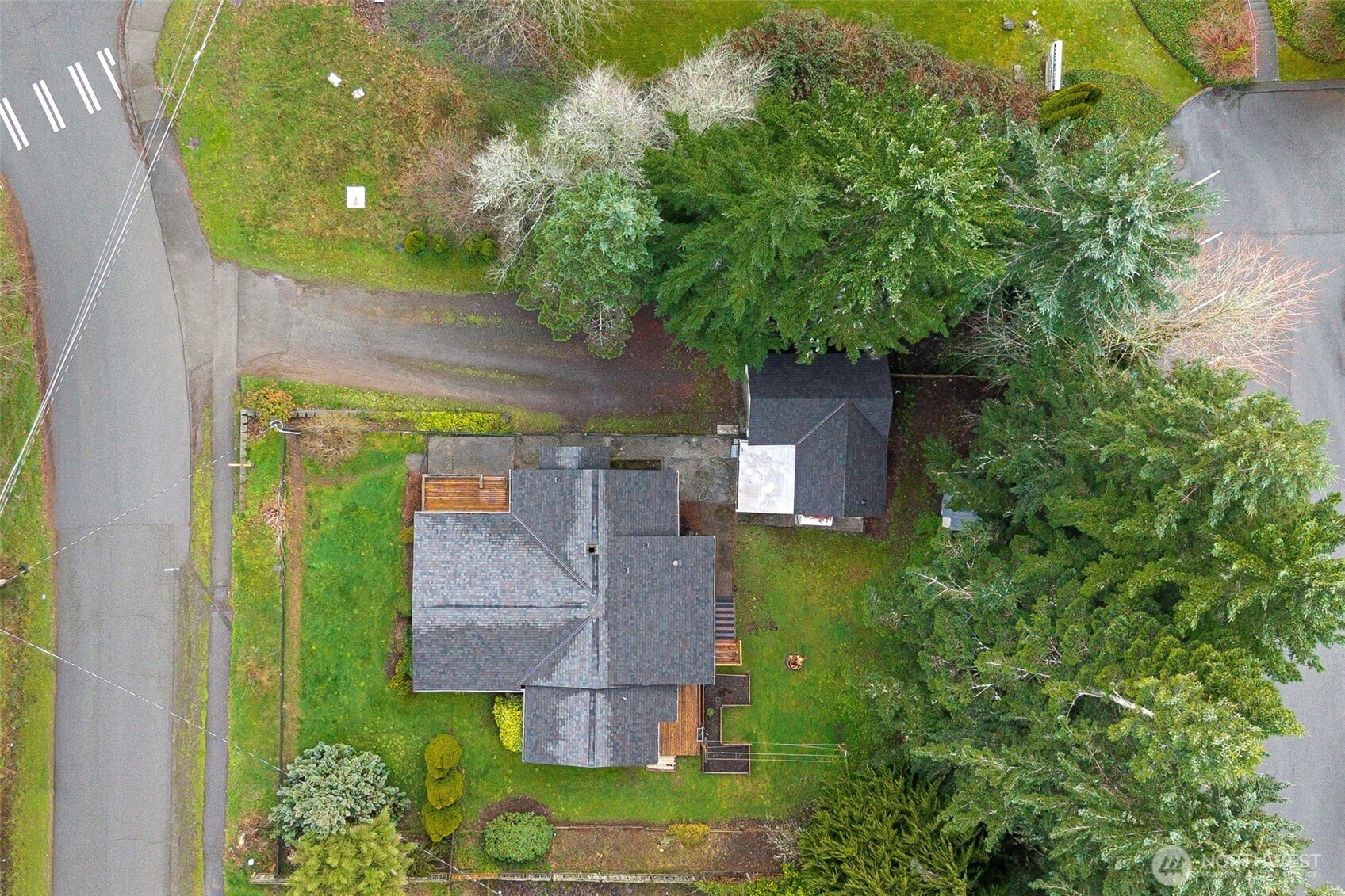 26009 Barrett Road Northeast Kingston, WA 98346 - Photo 25 of 25 an aerial view of a house with a yard