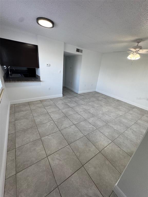 1195 Bentley Road, Unit 1 Leesburg, FL 34748 - Photo 3 of 13 a view of a livingroom and a flat screen tv