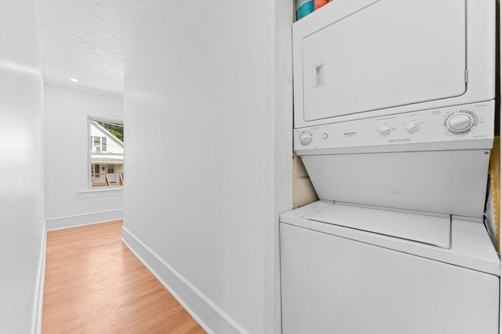 14 Glendale Street, Unit 14 Maynard, MA 01754 - Photo 19 of 29 a utility room with dryer and washer