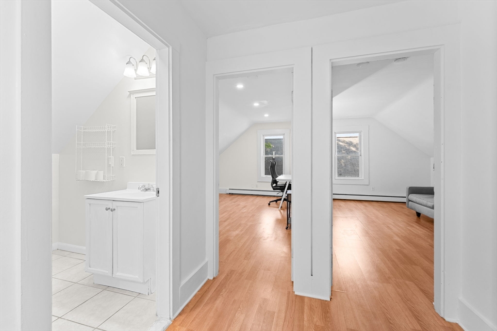 14 Glendale Street, Unit 14 Maynard, MA 01754 - Photo 20 of 29 a view of empty room with wooden floor