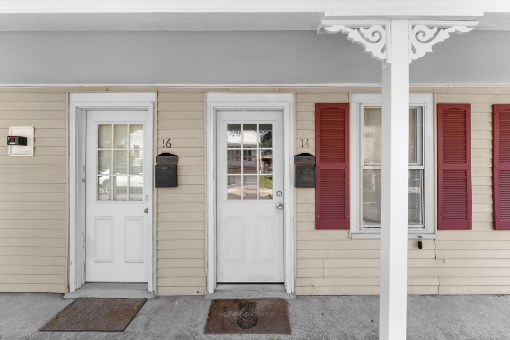 14 Glendale Street, Unit 14 Maynard, MA 01754 - Photo 26 of 29 front view of a house with a glass door