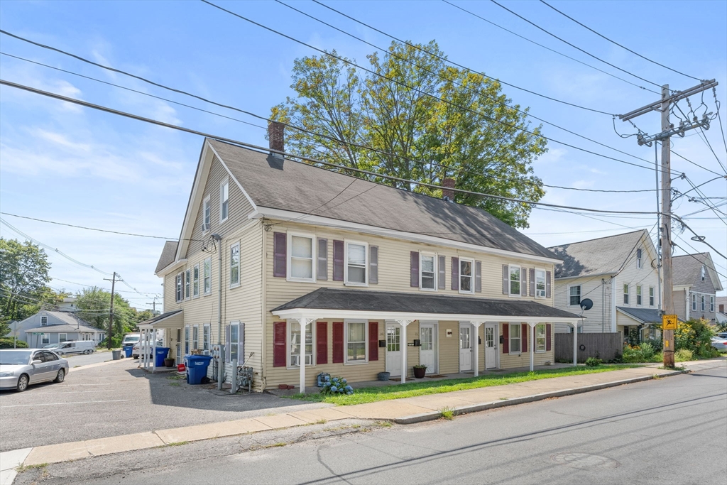 14 Glendale Street, Unit 14 Maynard, MA 01754 - Photo 28 of 29 a front view of a building with street view