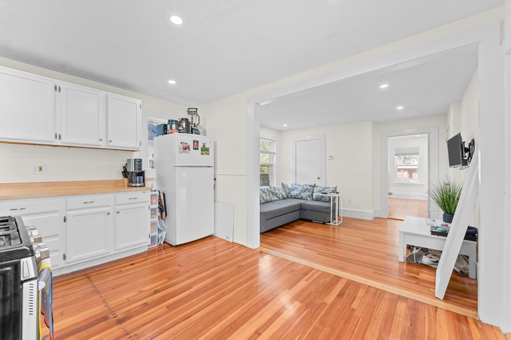 14 Glendale Street, Unit 14 Maynard, MA 01754 - Photo 8 of 29 a view of a kitchen with sink and wooden floor