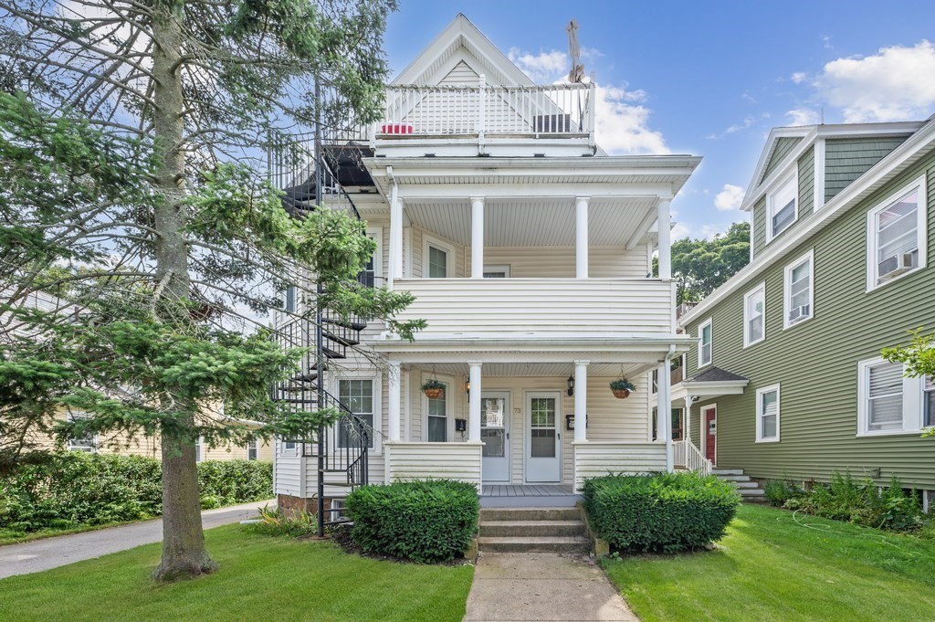 73 Cranch Street, Unit 73 Quincy, MA 02169 - Photo 1 of 22 front view of a house with a yard