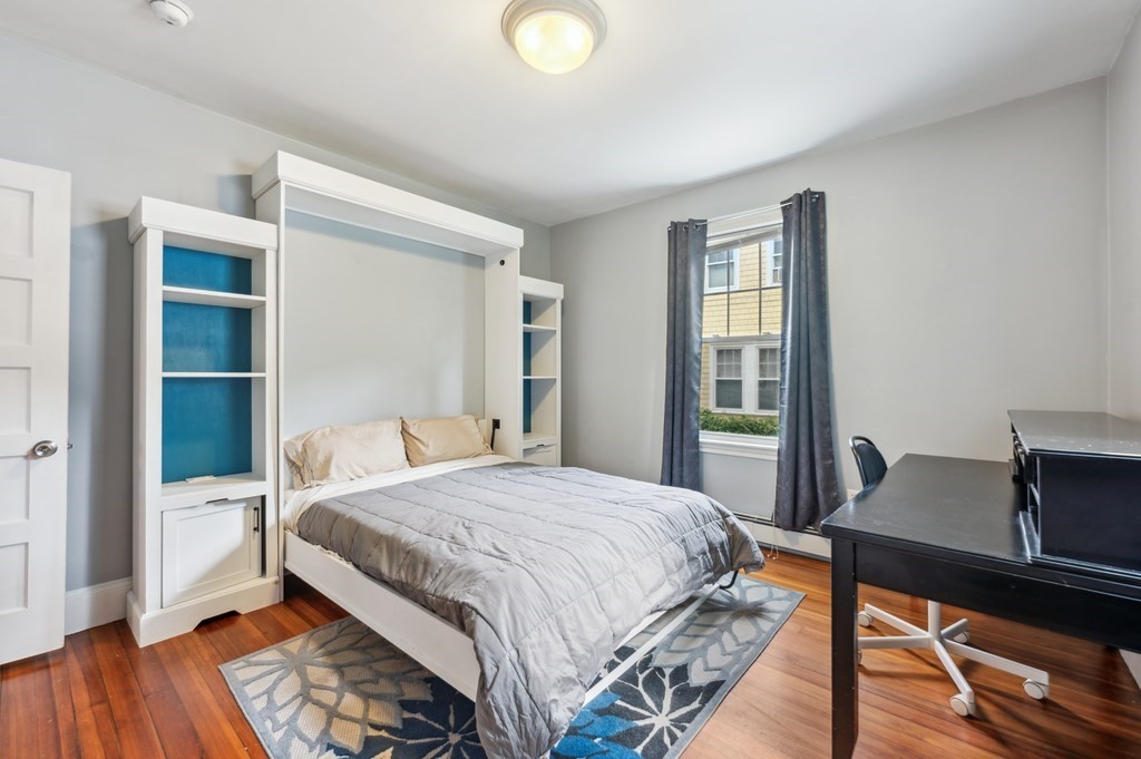 73 Cranch Street, Unit 73 Quincy, MA 02169 - Photo 11 of 22 a bedroom with a bed and a window