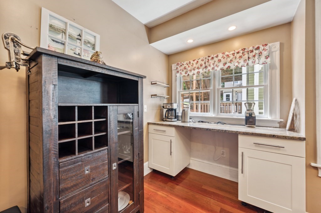 73 Cranch Street, Unit 73 Quincy, MA 02169 - Photo 14 of 22 a kitchen with stainless steel appliances granite countertop a stove and a sink