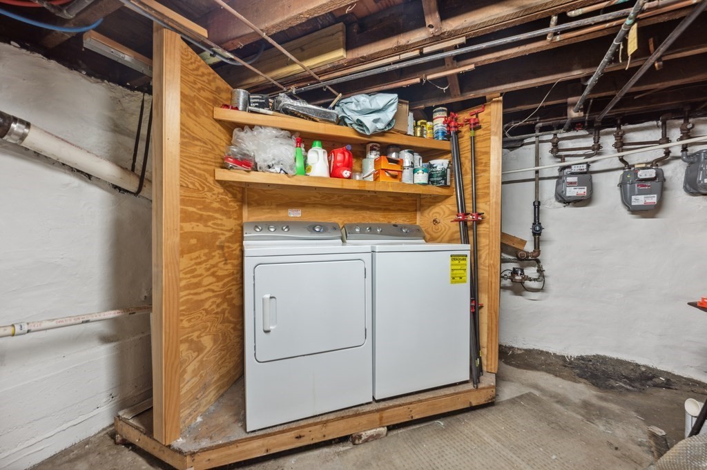 73 Cranch Street, Unit 73 Quincy, MA 02169 - Photo 19 of 22 a utility room with dryer and washer