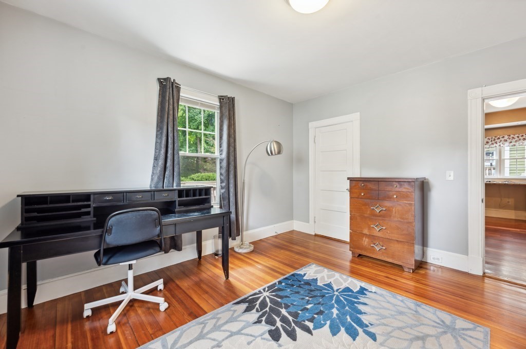 73 Cranch Street, Unit 73 Quincy, MA 02169 - Photo 10 of 22 a living room with furniture and a window