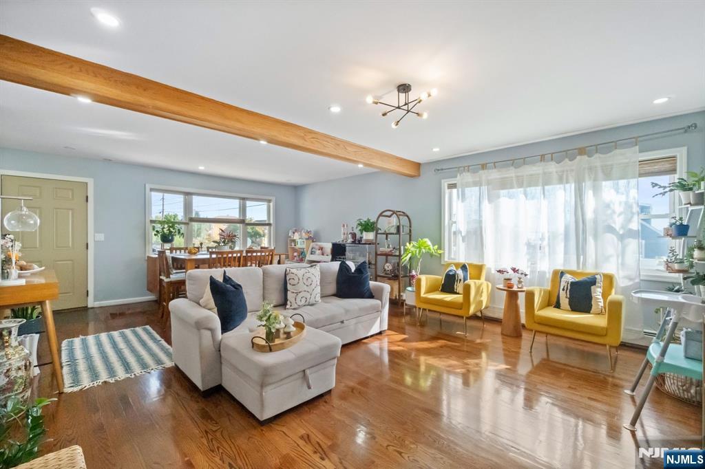 340 Marsan Drive Carlstadt, NJ 07072 - Photo 1 of 50 a living room with furniture or couch and a large window