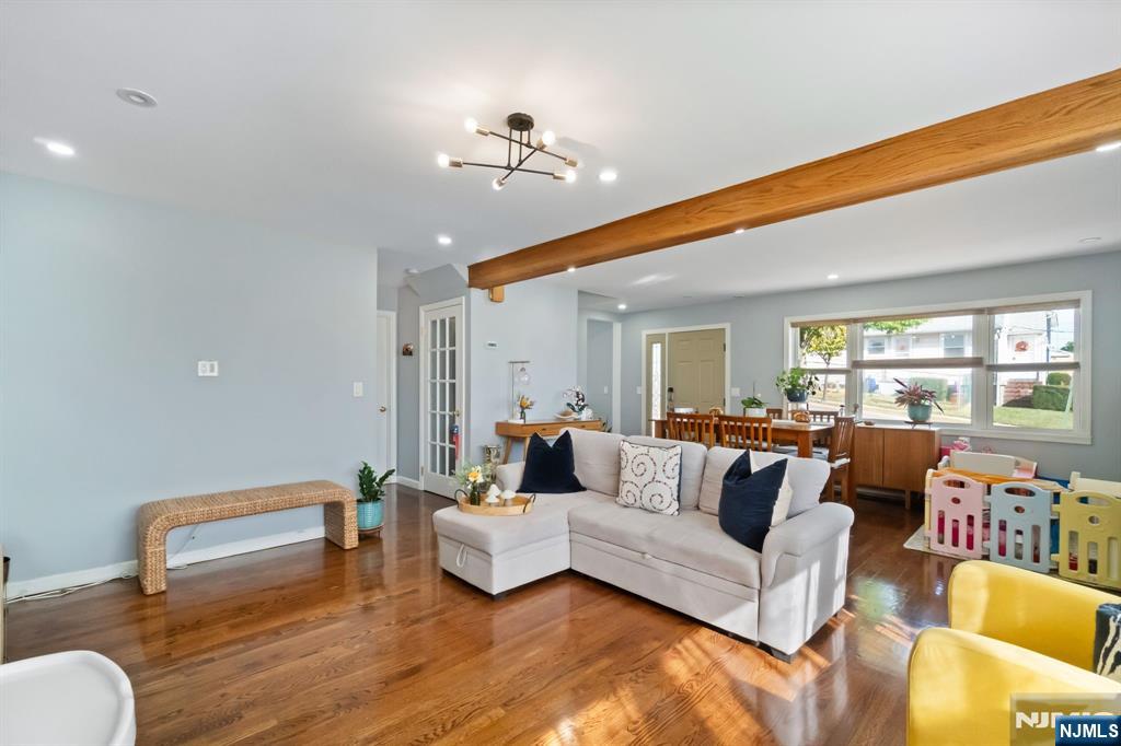 340 Marsan Drive Carlstadt, NJ 07072 - Photo 18 of 50 a living room with furniture and wooden floor