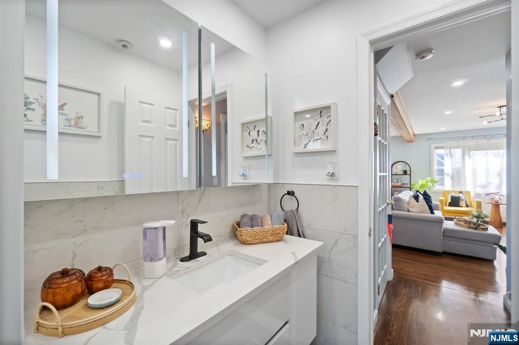 340 Marsan Drive Carlstadt, NJ 07072 - Photo 21 of 50 a kitchen with a refrigerator and a sink