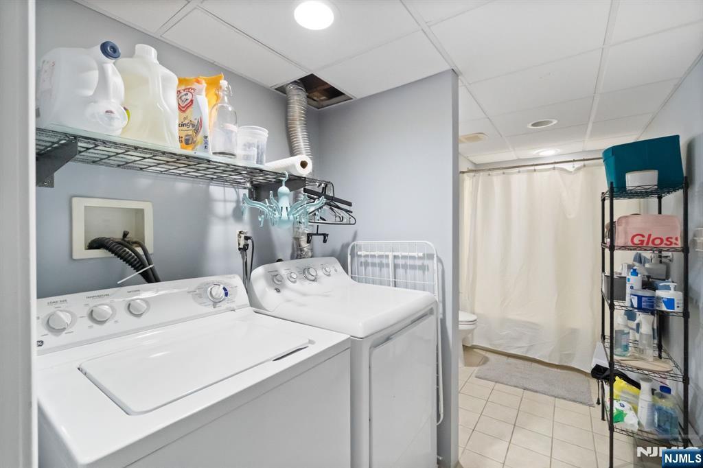 340 Marsan Drive Carlstadt, NJ 07072 - Photo 24 of 50 a utility room with dryer and washer