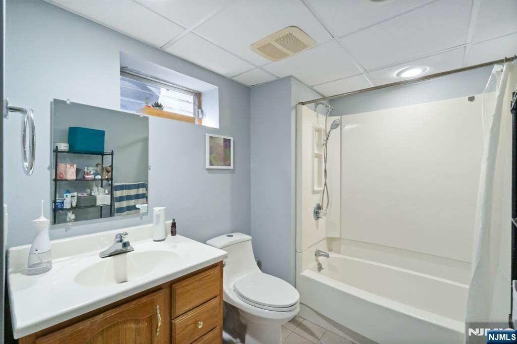 340 Marsan Drive Carlstadt, NJ 07072 - Photo 26 of 50 a bathroom with a sink toilet and shower